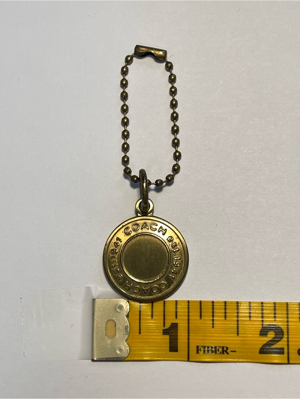 Coach Round Medallion Hang Tag Keychain Charm- Gold Tone